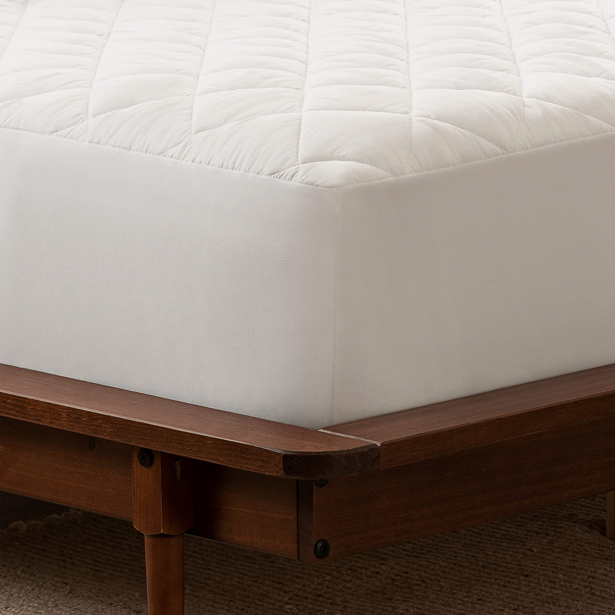 Serta Power Clean mattress pad with stain-release technology to simplify cleaning spills.
