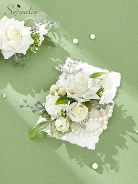 Serwalin corsage boutonniere set displayed together shows coordinated wedding accessories.