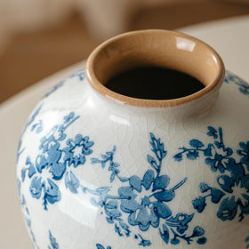 Elegant SEUYUCL vase styled on a bookshelf as decor.