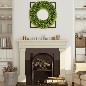 SEVENLOVE Boxwood Wreath with a durable plastic back for lasting shape.