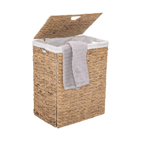 Rectangular lidded hamper with liner, easy laundry concealment at home.