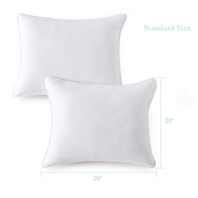 Seward Park pillow on bed demonstrates suitability for side, back, and stomach sleepers.
