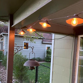 Sexoeie eye screw hook in outdoor wind chime setup.