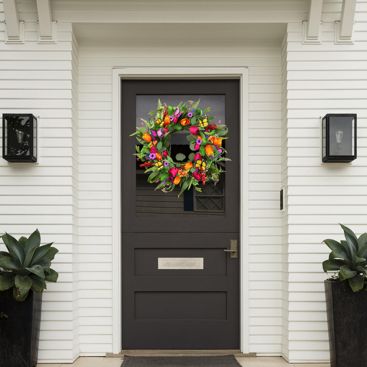Sggvecsy artificial tulips wreath with eucalyptus and butterflies for vivid detail.
