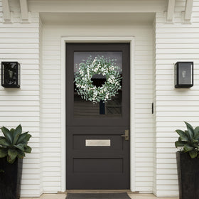 Sggvecsy boxwood wreath with flocked lambs ear and white berries close-up