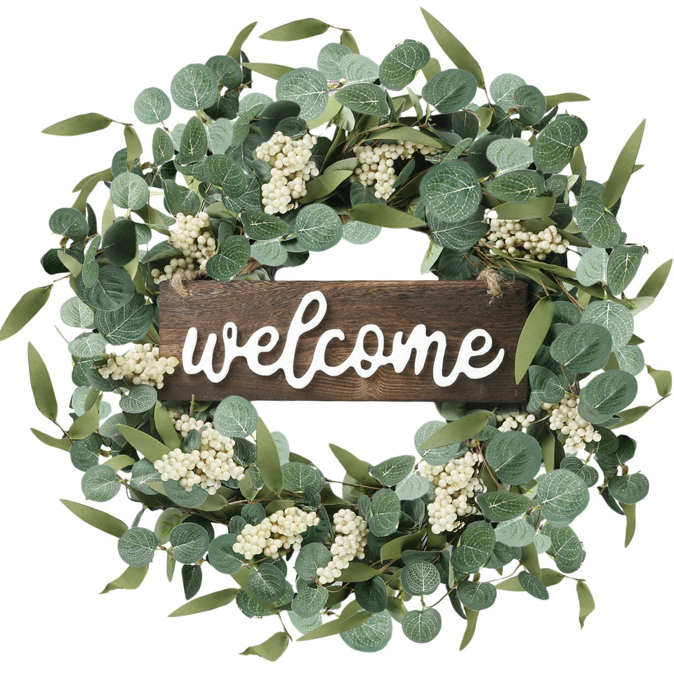 Sggvecsy green eucalyptus wreath with welcome sign on a door, natural and inviting appeal.