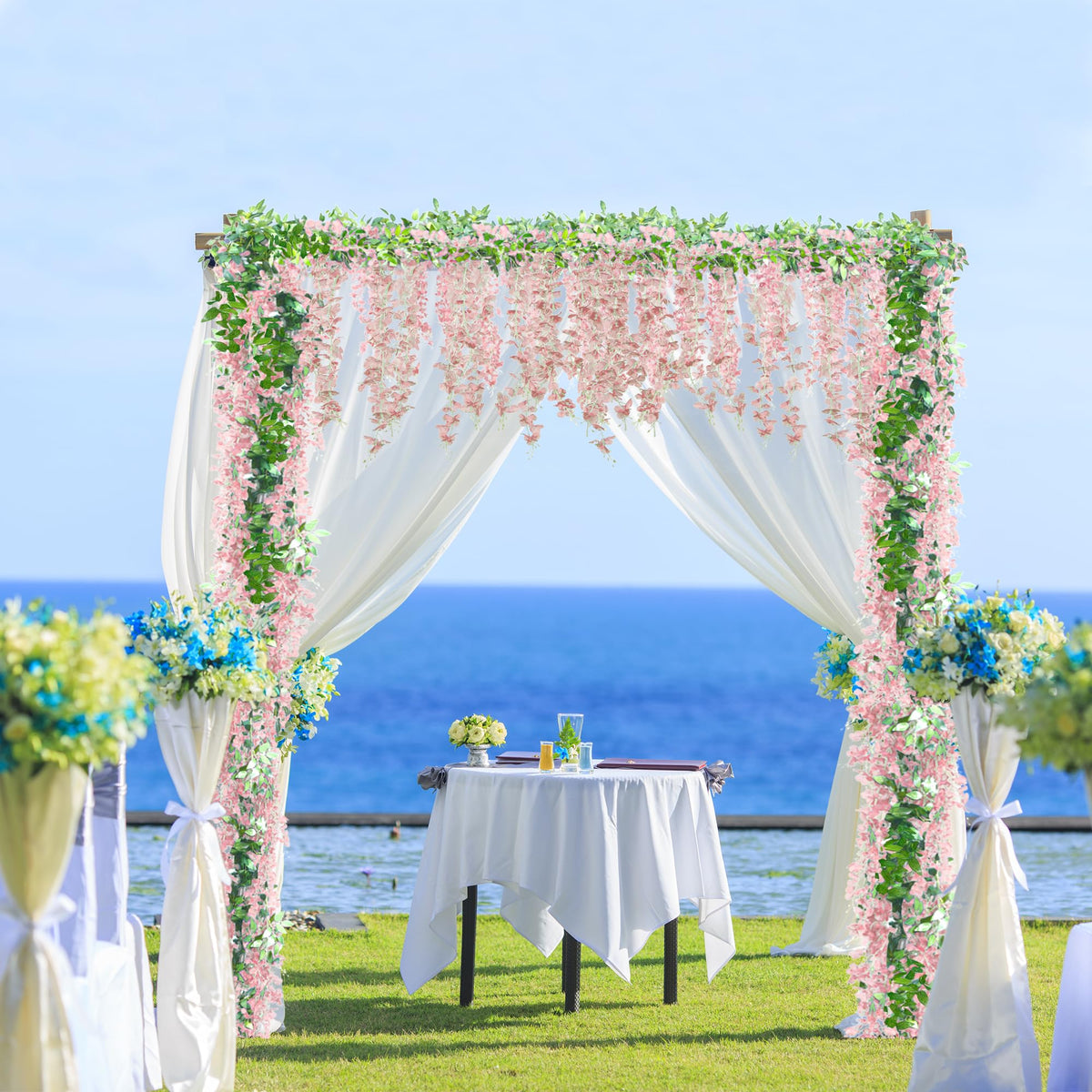 Sggvecsy pink wisteria garland used as a table centerpiece for events