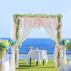 Sggvecsy pink wisteria garland used as a table centerpiece for events