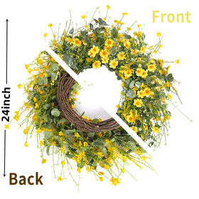 Sggvecsy yellow daisy wreath on an outdoor covered porch complements outdoor living.