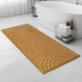 SHACOS mustard bathroom runner close-up on floor highlights boho stripe design