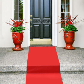 Shappy red carpet runner used for wedding decor and festive occasions.