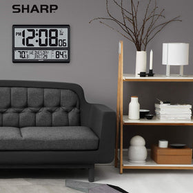 Sharp Atomic Clock displays calendar and day of week for daily context.