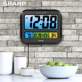 Sharp Atomic Clock in a living room setup for family planning