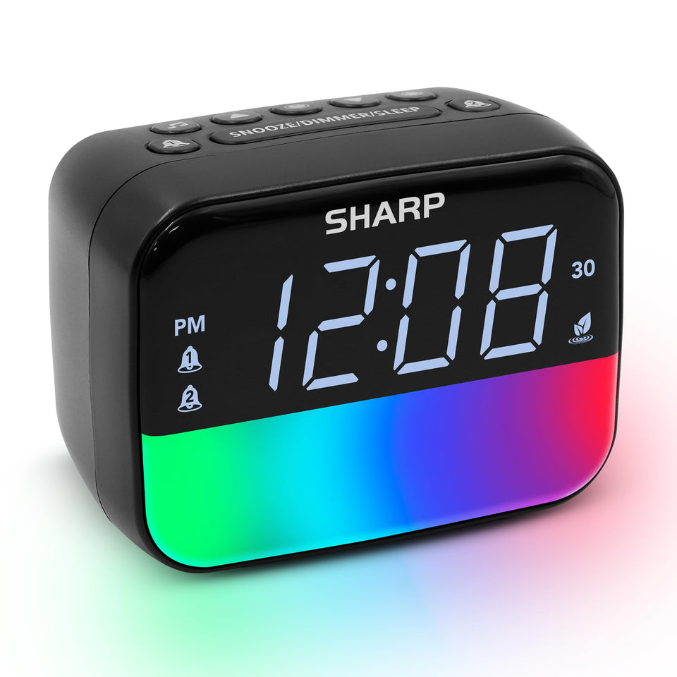 Sharp multi-color Bluetooth alarm clock on a nightstand with a bright display for easy viewing.