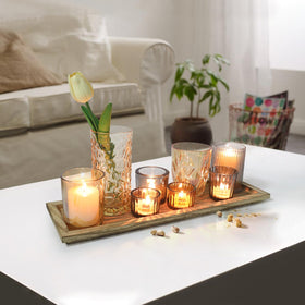 SHOHAYTO mantel display with softly glowing votives enhances seasonal decor