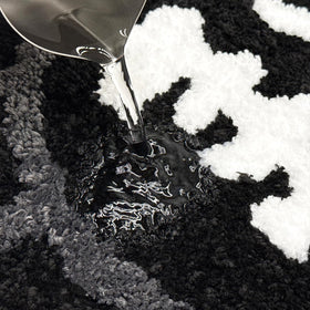 Shovagy Trippy Happy Face Rug adds Halloween gothic flair to bedrooms or game rooms.