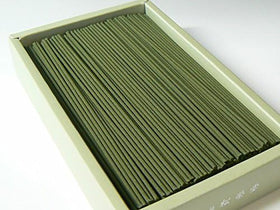 Lit Moss Garden Nokiba incense creates a calming ambiance in a cozy living room