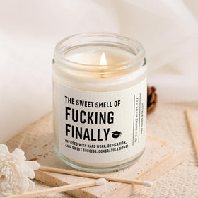 Shqiueos soy wax candle in a reusable glass jar.