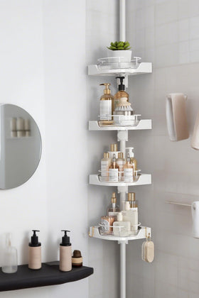 Shuang Qing 360° rotating corner shower caddy for easy access to essentials.