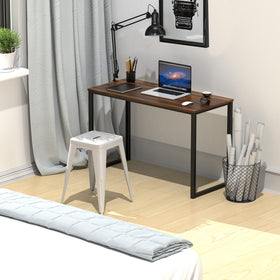 SHW Mission desk in room setting shows compact footprint in a home office.