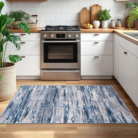 SIILOOM navy-gray-neutral-multi rug adds cozy texture to living room.