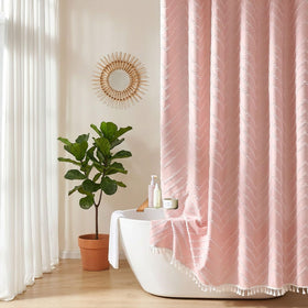 Siiluminisoy pink curtain elevates bathroom decor at home or hotel.