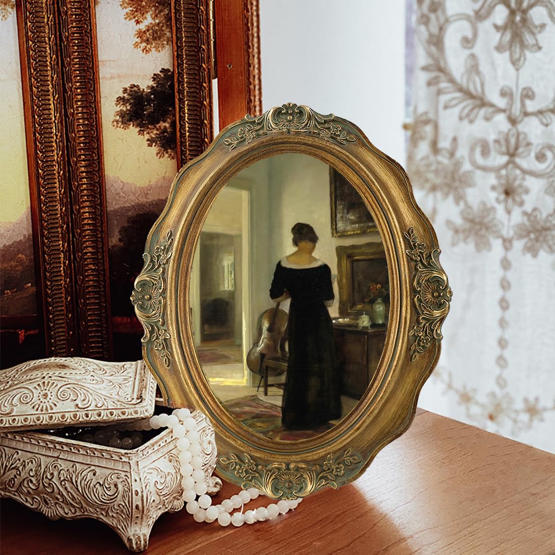 SIKOO oval frame with bronze-gold finish highlights heirloom photos.