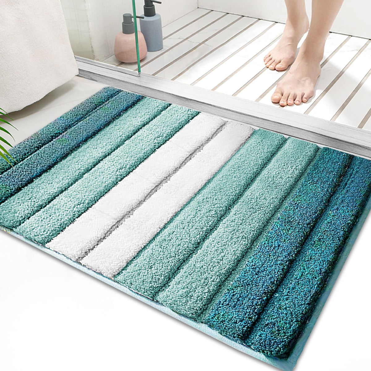 SiliPacks bathroom rug in turquoise offers plush microfiber comfort.