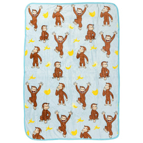 Silver Buffalo Curious George blue fleece throw featuring bananas, ideal for cozy movie nights.