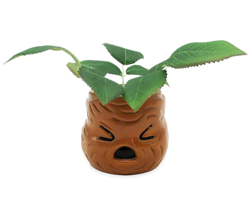 Silver Buffalo Mandrake planter with faux plant adds Hogwarts charm to desks