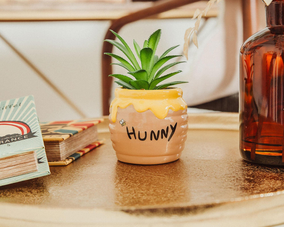 Silver Buffalo home and office decor planter brings playful charm to any room.