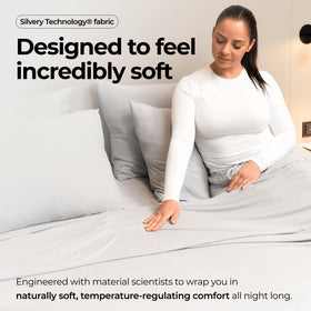 Silvery bed sheets on bed demonstrate fresh, long-lasting cleanliness.