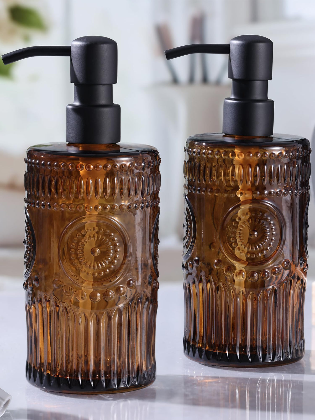 Simeitol sunflower embossed glass soap dispenser in amber adds decorative elegance to any sink.