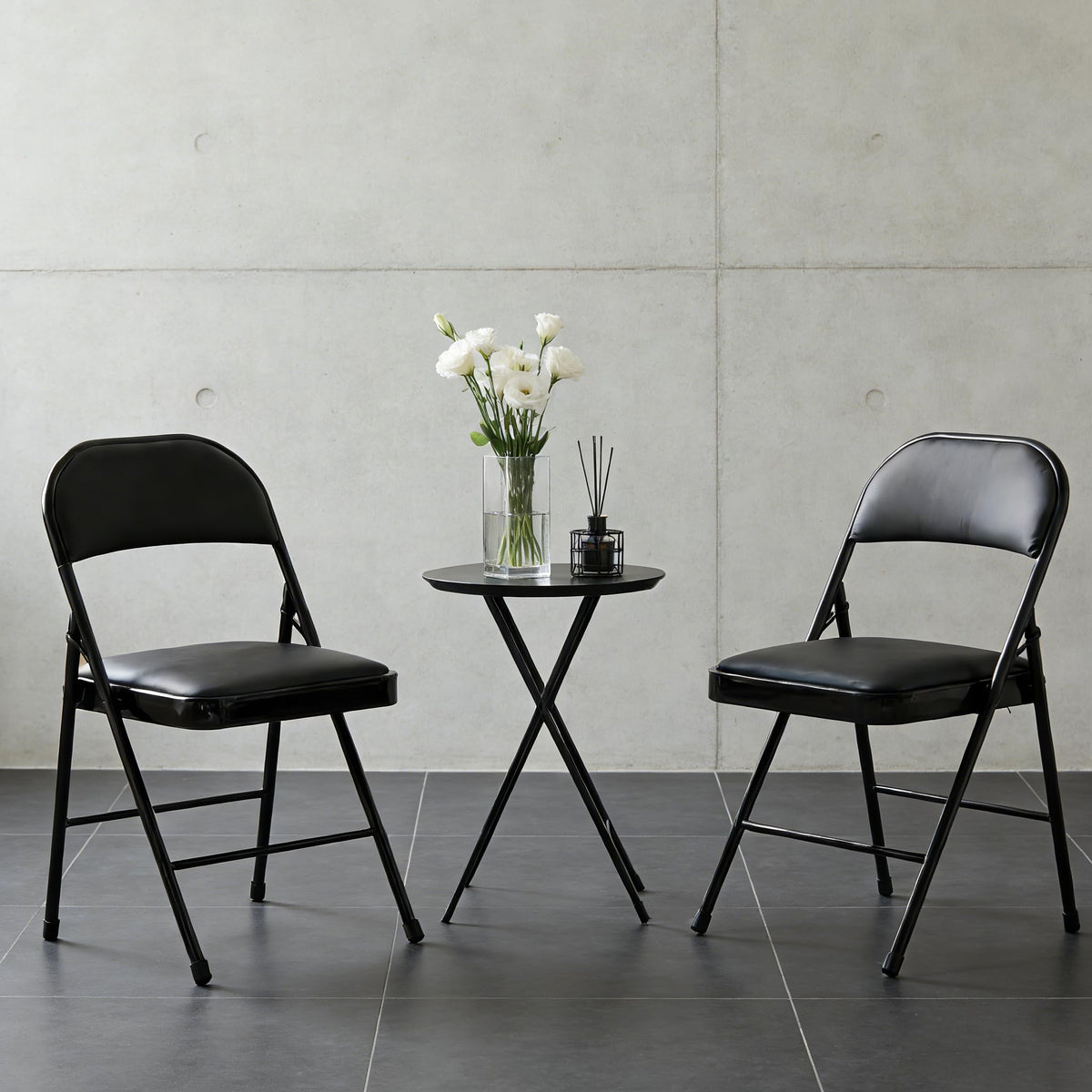 Simple Deluxe padded folding chair backrest offers ergonomic comfort.