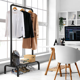 Simple Houseware 60-inch tall rack holding clothes and accessories.