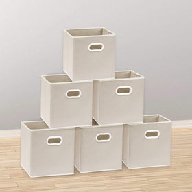 Beige storage bins stacked neatly on shelves saves space.