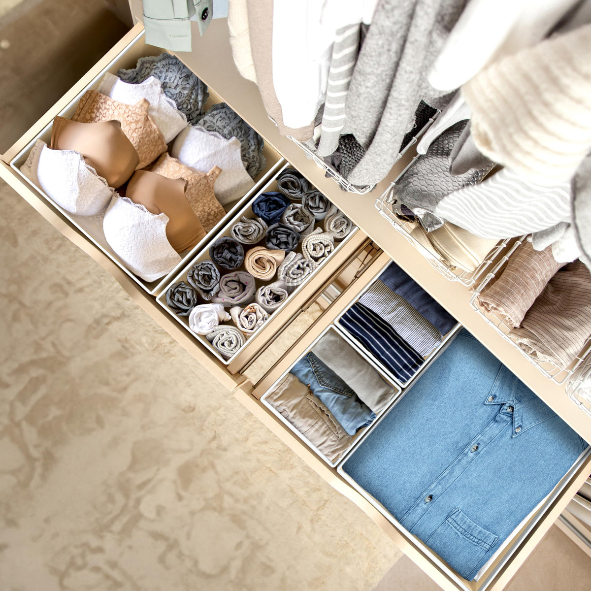Simple Houseware beige medium-bin showcasing belts organized by category.