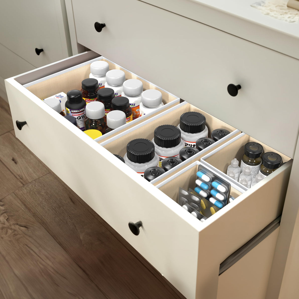 Simple Houseware beige small-bin with folded ties in a drawer.