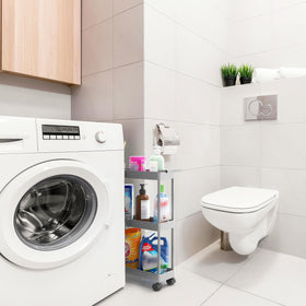 Simple Houseware slim cart placed between washer and dryer for laundry access
