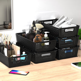 Simple Houseware stackable basket organizer in bathroom for toiletries.