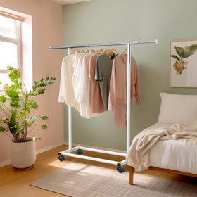 Dimensions of Simple Houseware rack show 48x58 inches for ample hanging space
