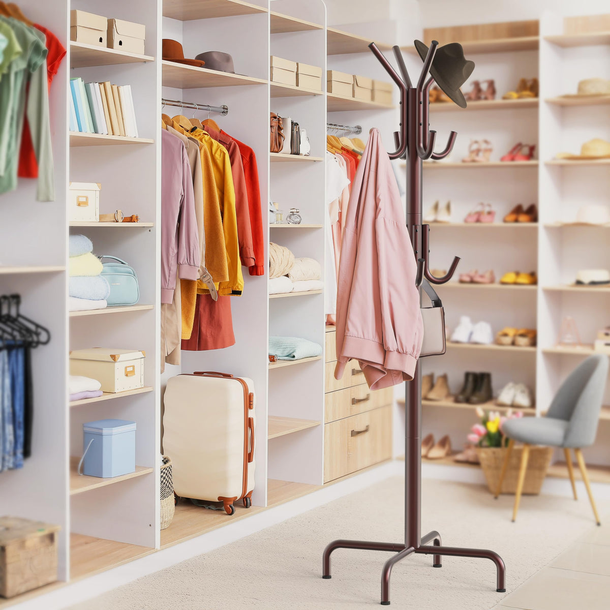 Simple Houseware standing coat hanger assembled with coats illustrating practicality and storage.