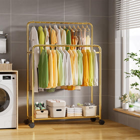 Simple Trending gold rack highlights a bottom shelf ideal for boxes and accessories.
