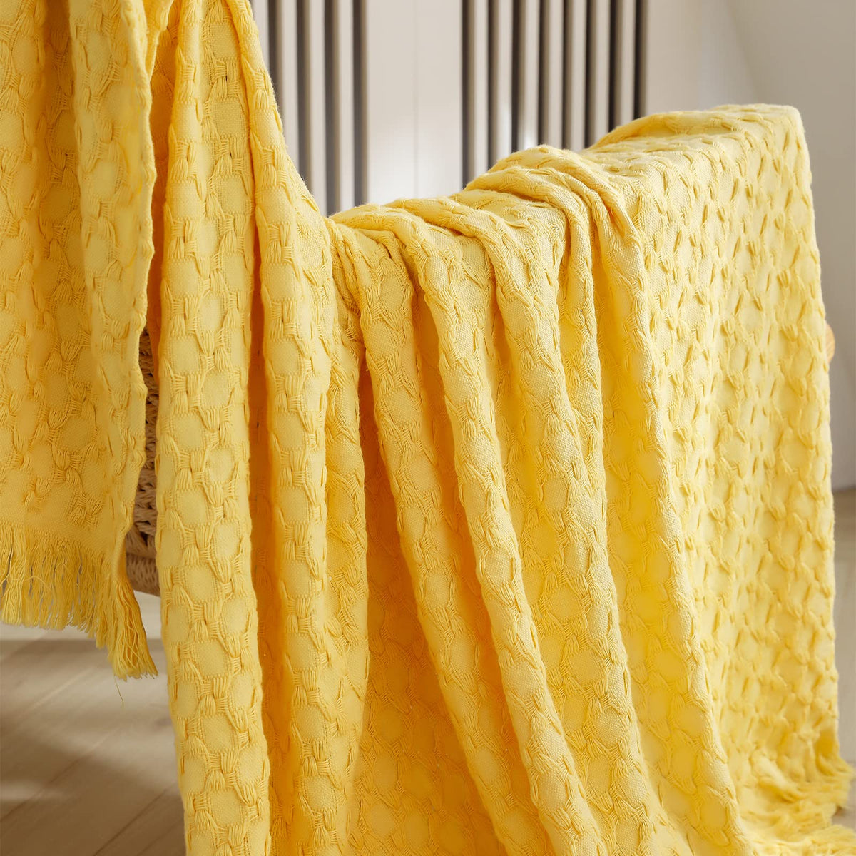 Simple&Opulence blanket shown as a versatile all-season home essential