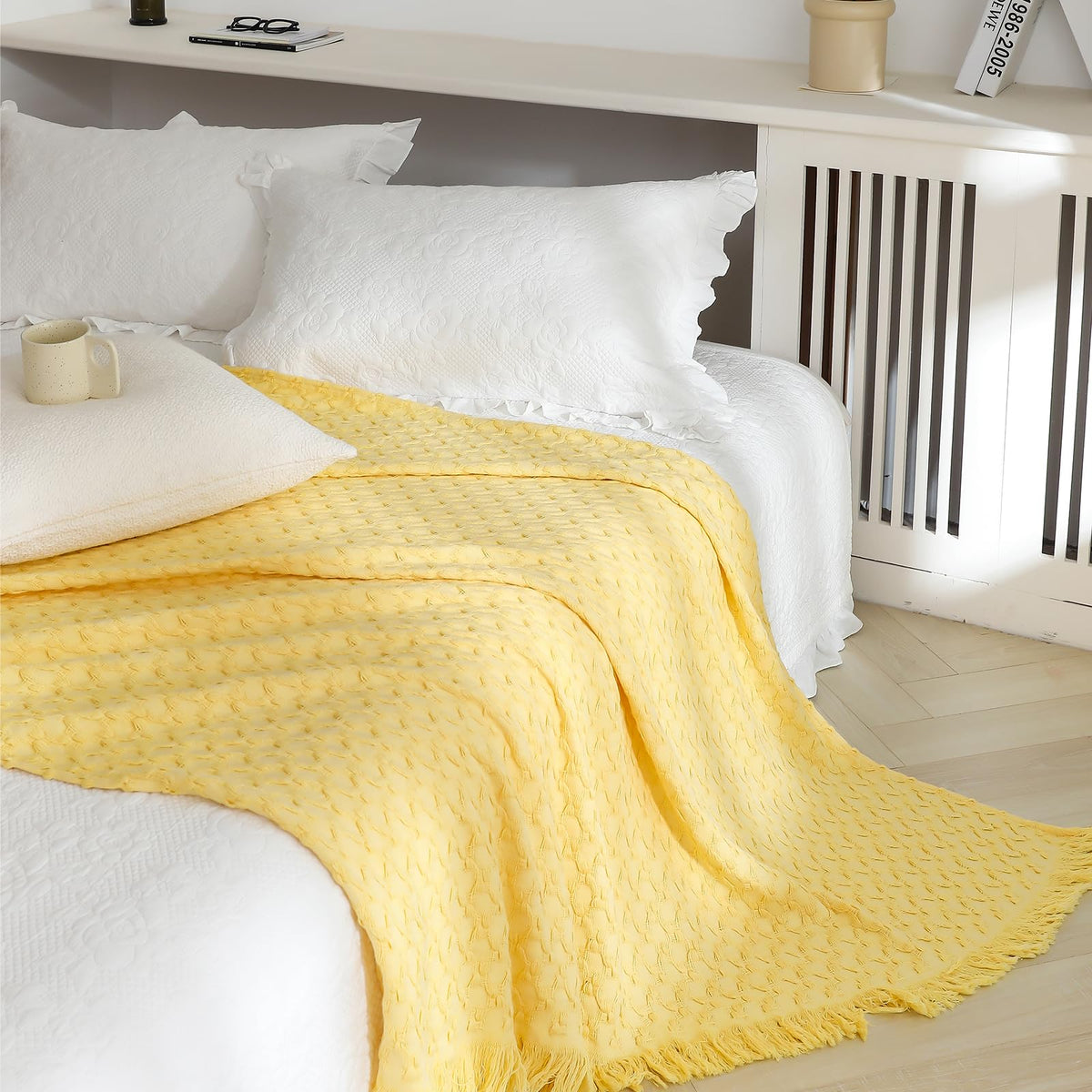 Simple&Opulence throw blanket on a couch, cozy and breathable for year-round comfort