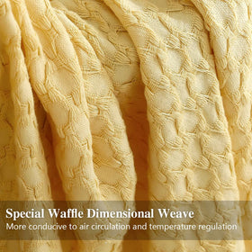 Waffle weave texture highlights the blanket's three-dimensional plush look