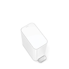 simplehuman internal hinge lets the lid open flush against the wall.