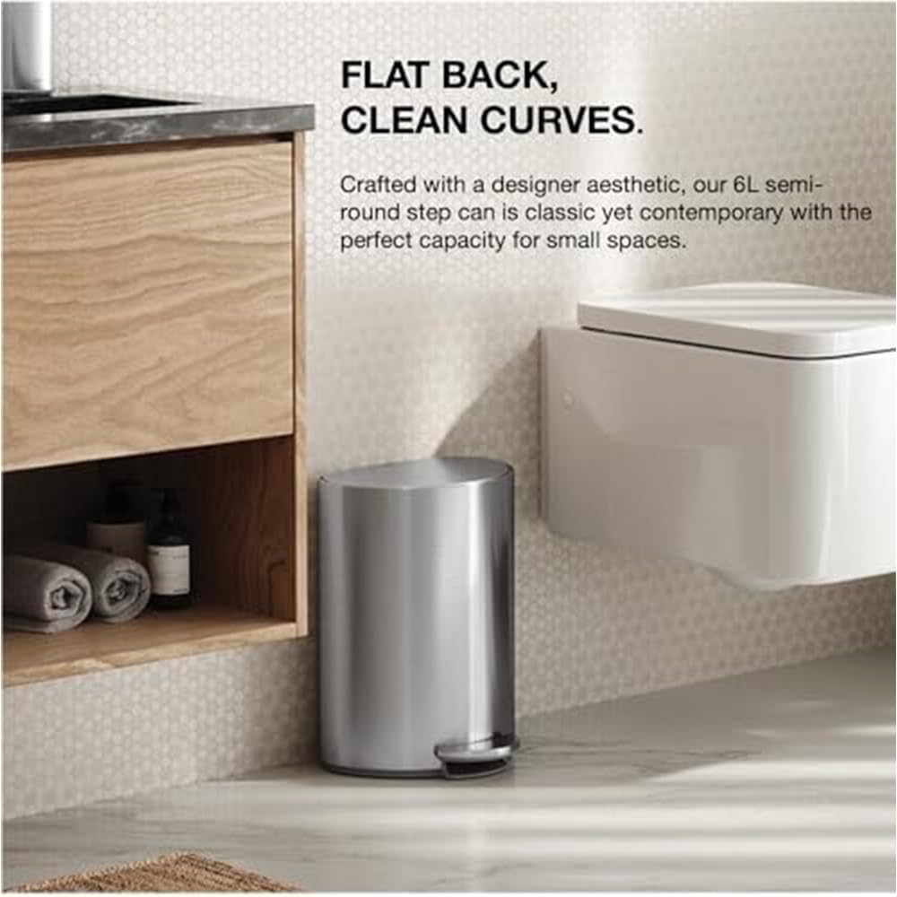 simplehuman internal hinge enables flush against wall with smooth lid movement.