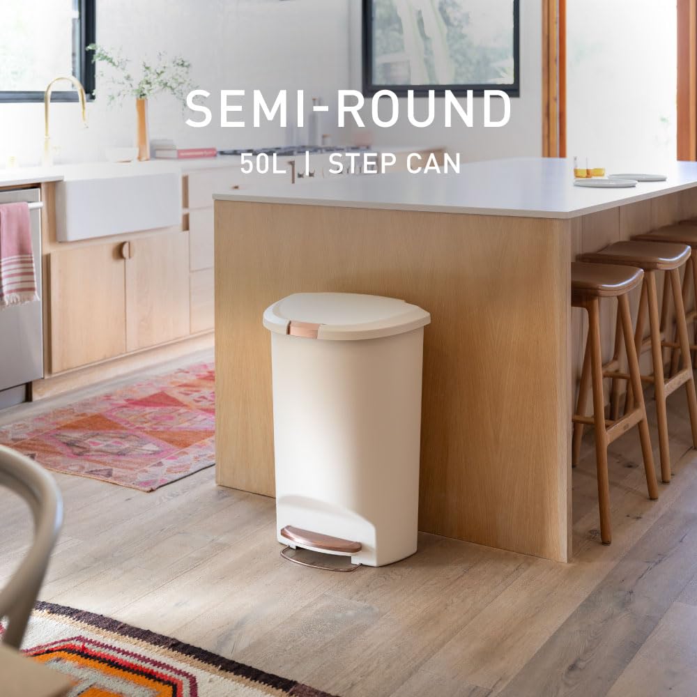 Simplehuman semi-round step can back fits flush against wall for clean lines.