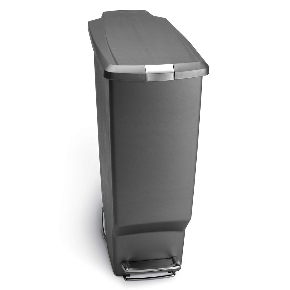 simplehuman slim trash can pedal enables hands-free operation with smooth action.